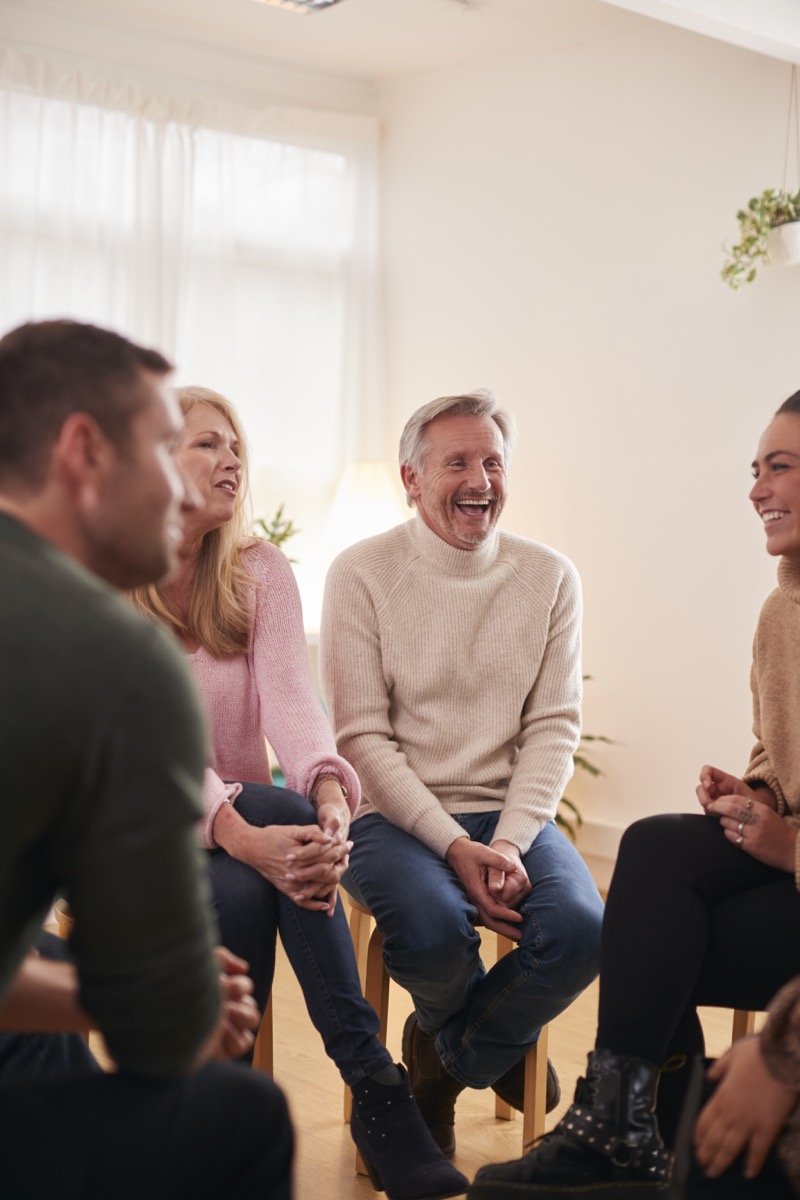 Adults participating in a supportive group setting